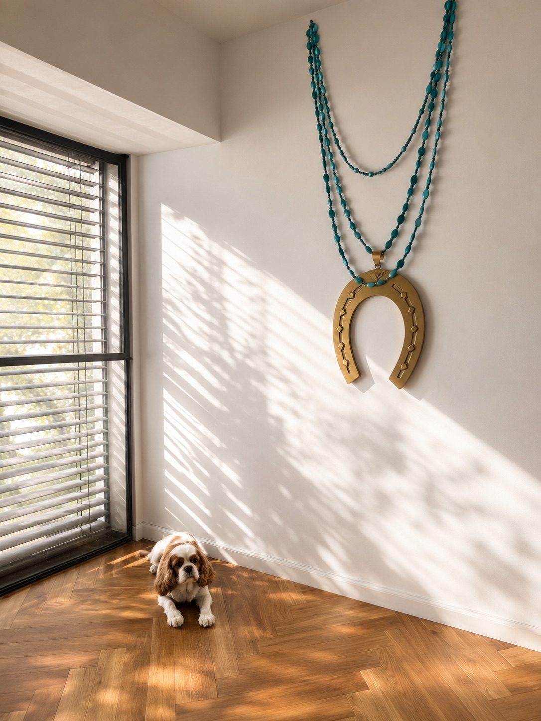 HORSESHOE wall necklace by Tali Veinrib, gilded brass on a strand of turquoise beads, view 4