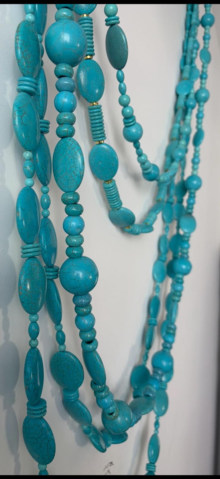 HORSESHOE WALL NECKLACE, turquoise strands detail
